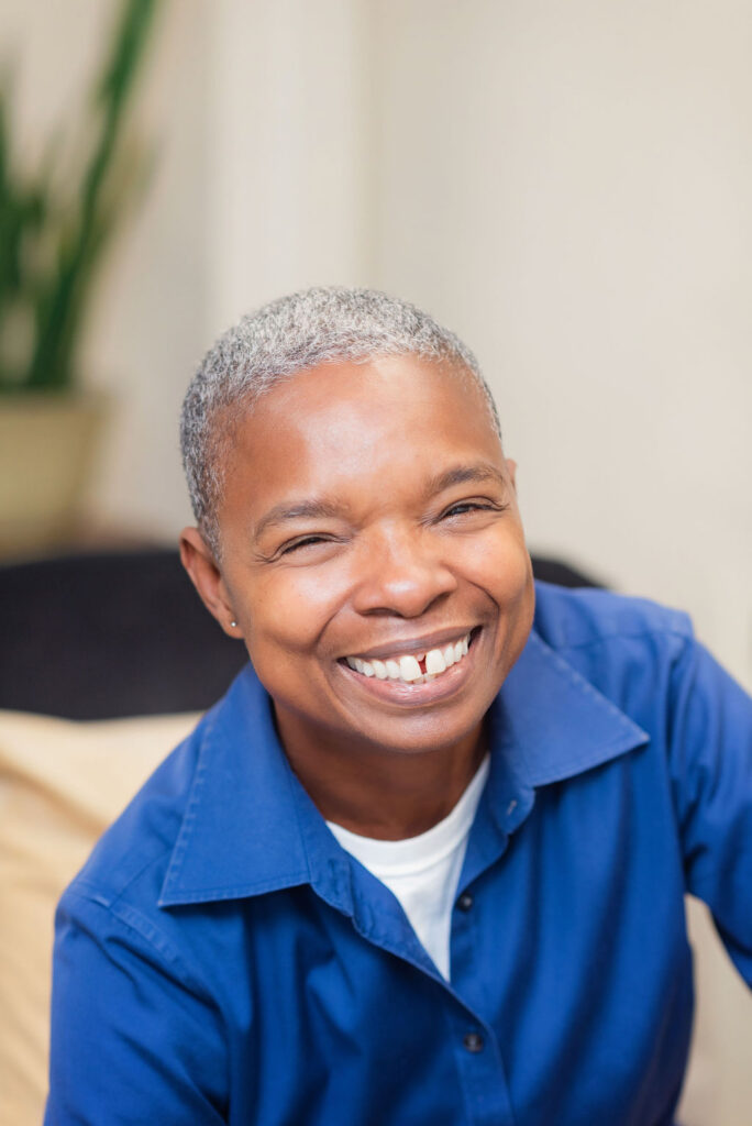 PJ smiling Sakhon headshot 684x1024